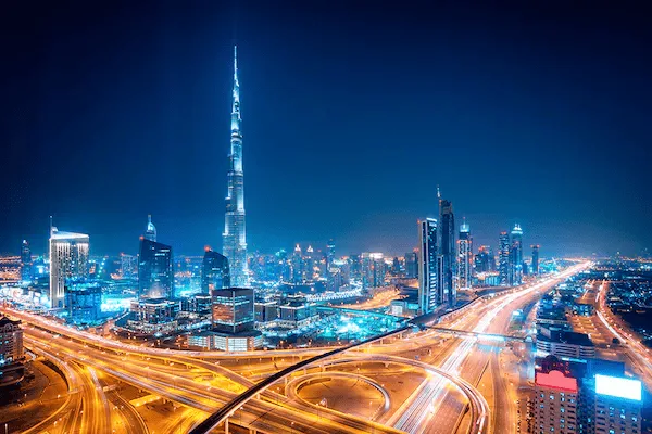 Dubai skyline and road network at night